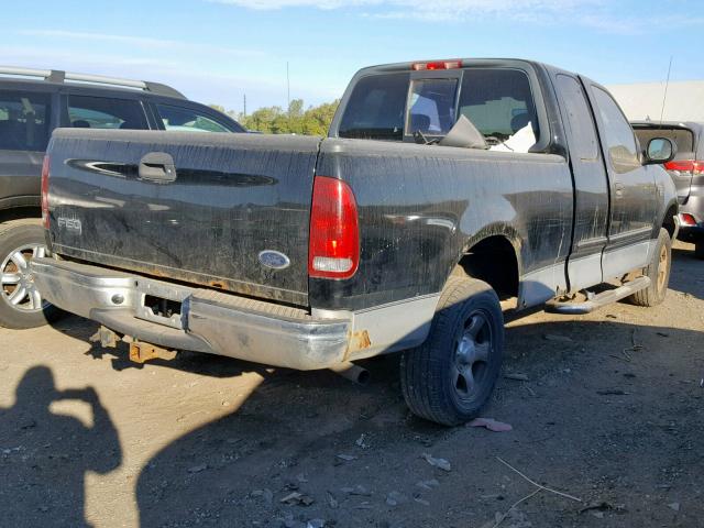 2FTRX18W04CA18594 - 2004 FORD F-150 HERI BLACK photo 4