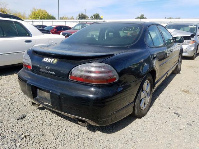 1G2WP52K8WF273618 - 1998 PONTIAC GRAND PRIX BLACK photo 4