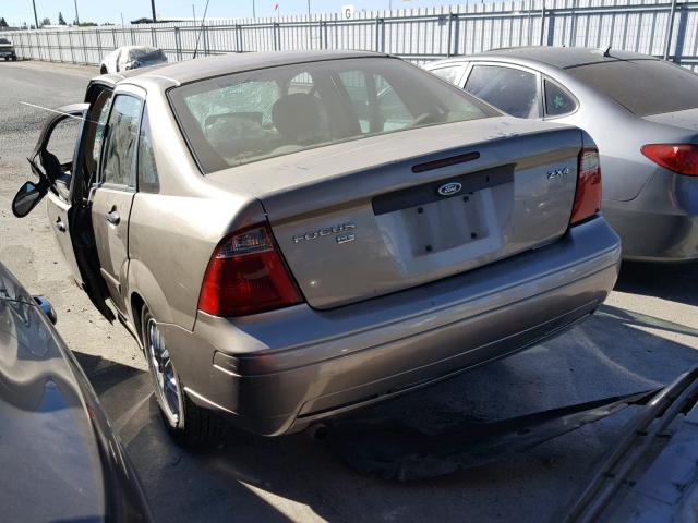 1FAFP34N05W114975 - 2005 FORD FOCUS ZX4 BROWN photo 3