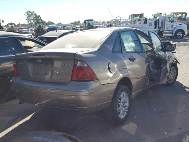 1FAFP34N05W114975 - 2005 FORD FOCUS ZX4 BROWN photo 4