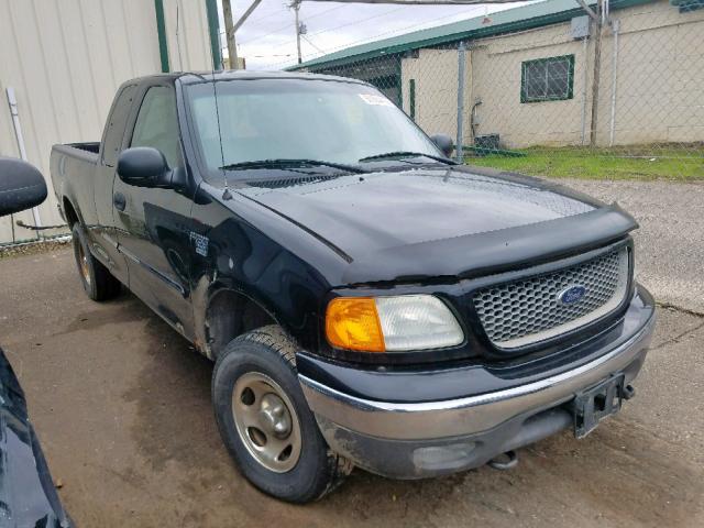 2FTRX18WX4CA30879 - 2004 FORD F-150 HERI BLACK photo 1