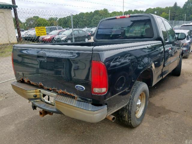 2FTRX18WX4CA30879 - 2004 FORD F-150 HERI BLACK photo 4