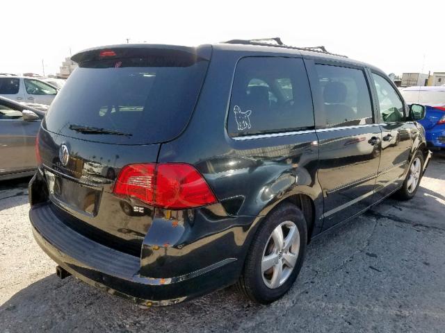 2C4RVABG0CR222301 - 2012 VOLKSWAGEN ROUTAN SE BLACK photo 4