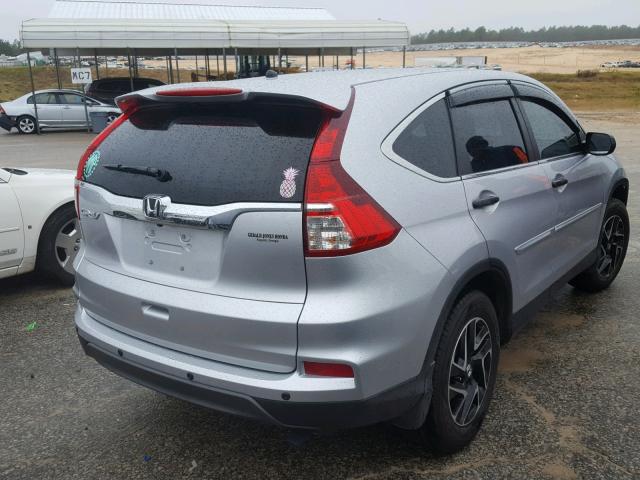 2HKRM3H33GH568512 - 2016 HONDA CR-V LX SILVER photo 4