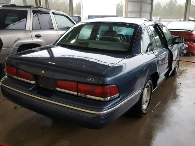 2FALP74W1VX162654 - 1997 FORD CROWN VICT BLUE photo 4