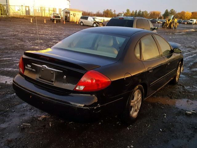 1FAFP56S81G253481 - 2001 FORD TAURUS SEL BLACK photo 4