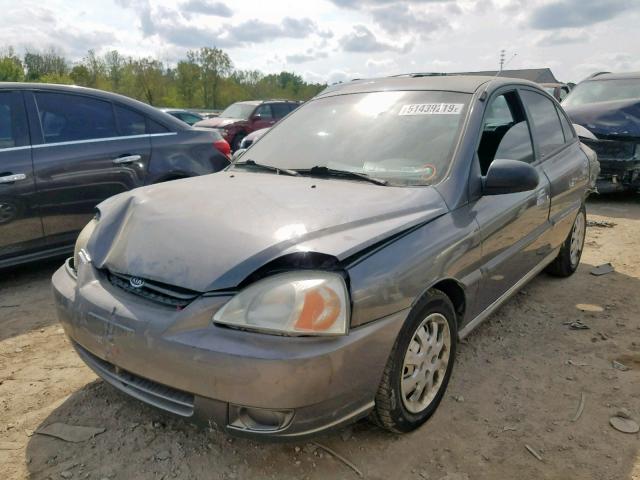 KNADC125636279606 - 2003 KIA RIO GRAY photo 2