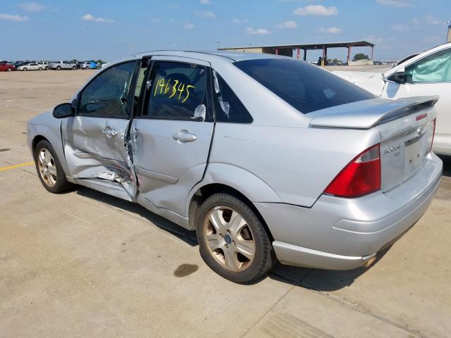 1FAHP38Z45W183741 - 2005 FORD FOCUS ZX4 SILVER photo 3