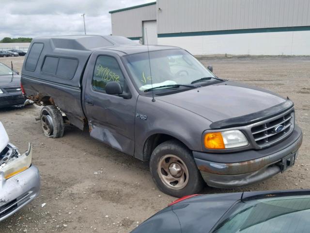 2FTRF17264CA16057 - 2004 FORD F-150 HERI GRAY photo 1