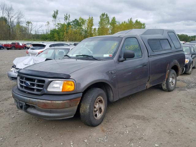 2FTRF17264CA16057 - 2004 FORD F-150 HERI GRAY photo 2