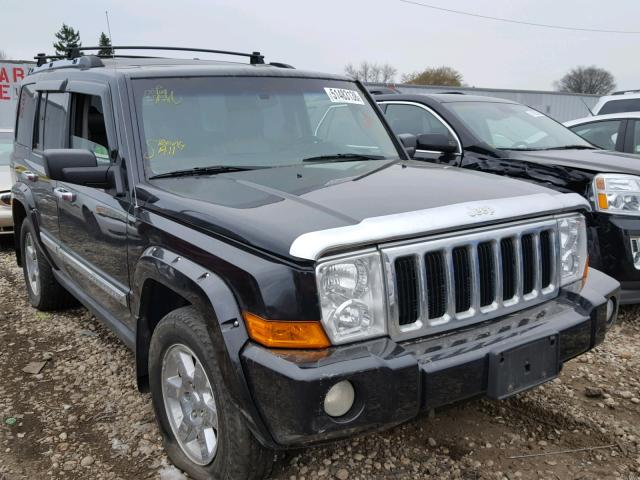 1J8HG58236C139766 - 2006 JEEP COMMANDER BLACK photo 1