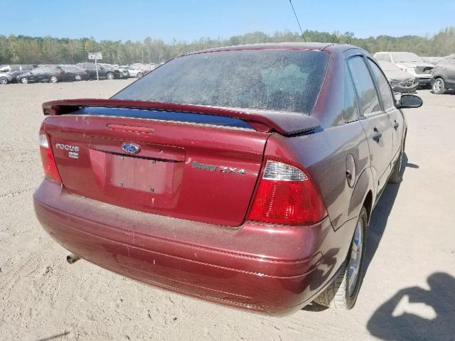 1FAHP34N66W223421 - 2006 FORD FOCUS ZX4 MAROON photo 4