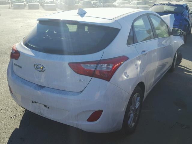 KMHD35LE8DU061264 - 2013 HYUNDAI ELANTRA GT WHITE photo 4