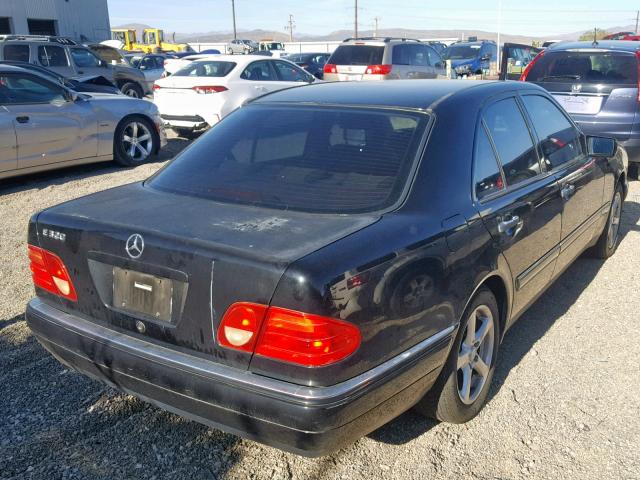 WDBJF65H8XA821001 - 1999 MERCEDES-BENZ E 320 BLACK photo 4