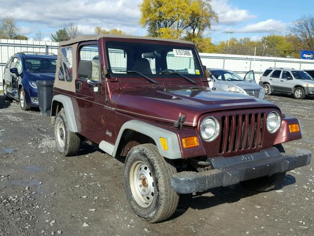 1J4FA29P32P734638 - 2002 JEEP WRANGLER / BURGUNDY photo 1