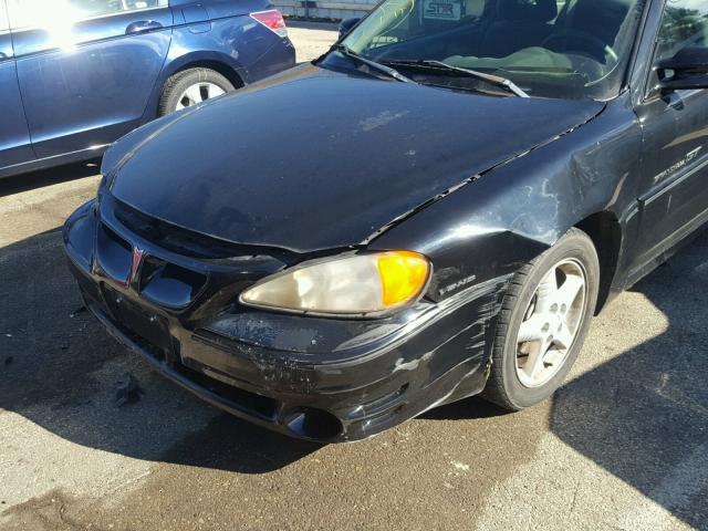 1G2NW12E0XM798512 - 1999 PONTIAC GRAND AM G BLACK photo 9