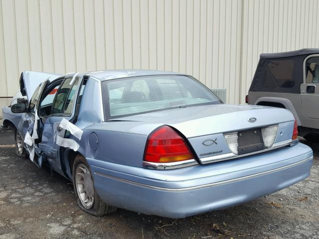 2FAFP74W7YX157637 - 2000 FORD CROWN VICT BLUE photo 3