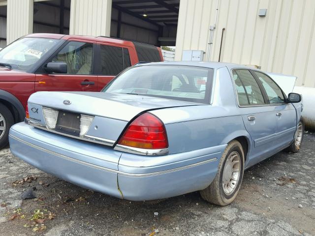 2FAFP74W7YX157637 - 2000 FORD CROWN VICT BLUE photo 4