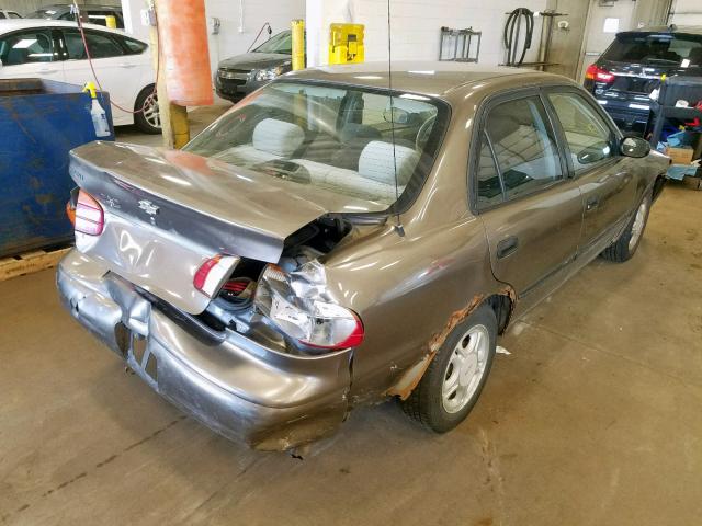 1Y1SK548XXZ412251 - 1999 CHEVROLET GEO PRIZM GOLD photo 4