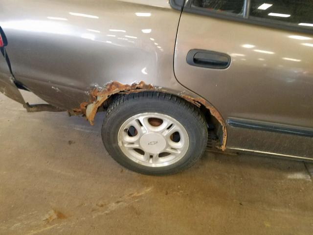 1Y1SK548XXZ412251 - 1999 CHEVROLET GEO PRIZM ოქროსფერი ფოტო 9