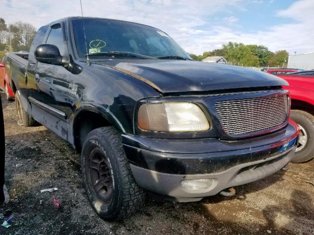 1FTRX18W22NB94991 - 2002 FORD F150 BLACK photo 1