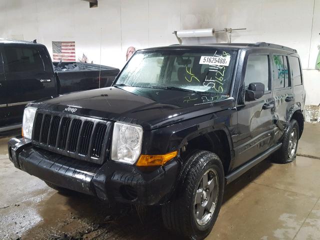 1J8HG48K86C144018 - 2006 JEEP COMMANDER BLACK photo 2