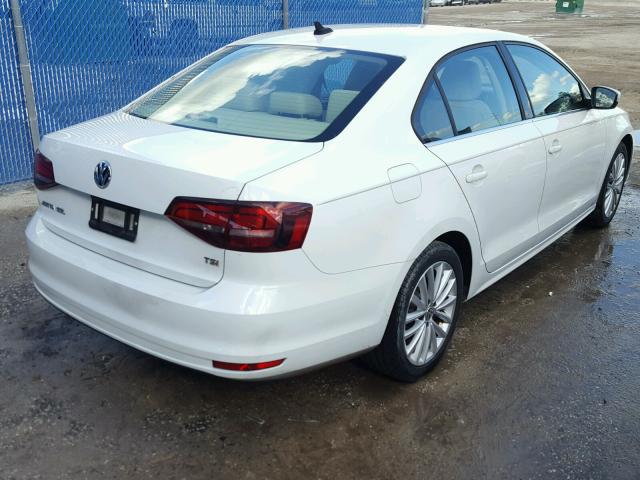 3VWL17AJ5GM204419 - 2016 VOLKSWAGEN JETTA SEL WHITE photo 4