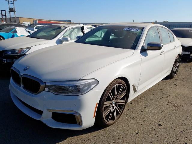 WBAJB9C51KB464235 - 2019 BMW M550XI WHITE photo 2