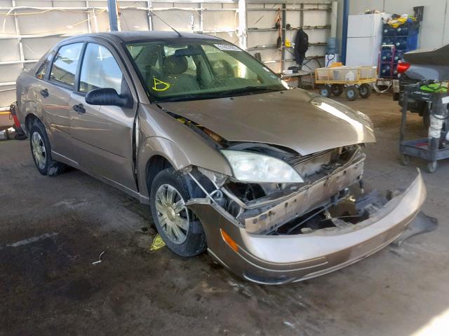 1FAFP34N35W132449 - 2005 FORD FOCUS ZX4 BROWN photo 1