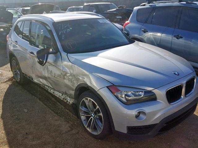 WBAVL1C57EVY17385 - 2014 BMW X1 XDRIVE2 SILVER photo 1