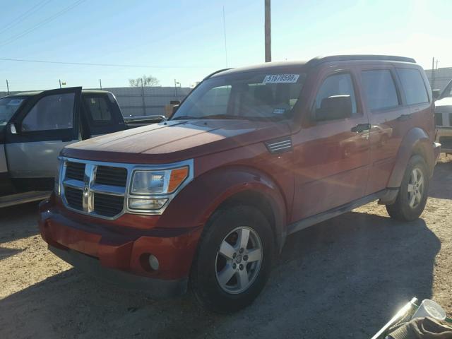 1D8GU28KX8W137932 - 2008 DODGE NITRO SXT ORANGE photo 2