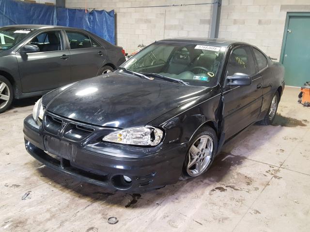 1G2NW12E82C164623 - 2002 PONTIAC GRAND AM G BLACK photo 2