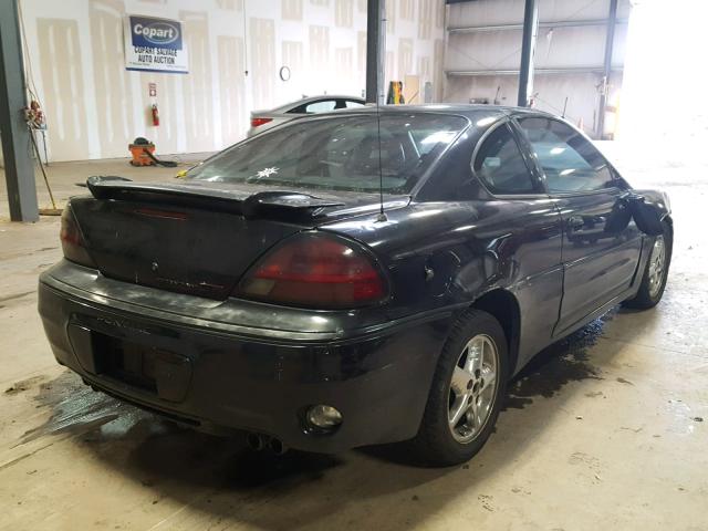 1G2NW12E82C164623 - 2002 PONTIAC GRAND AM G BLACK photo 4