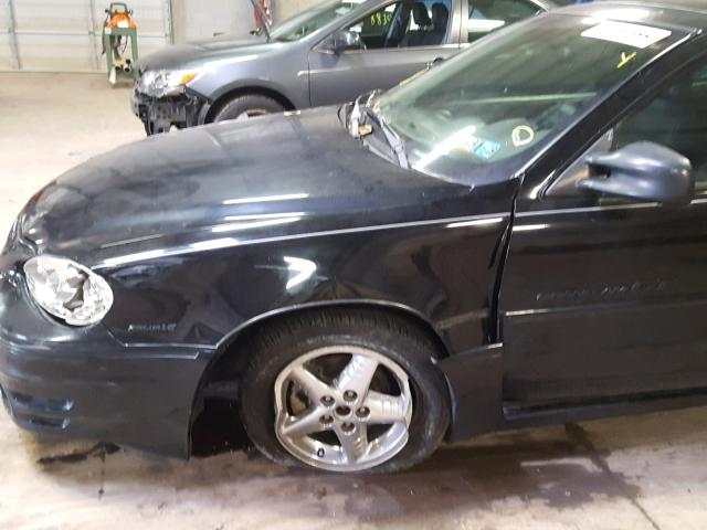 1G2NW12E82C164623 - 2002 PONTIAC GRAND AM G BLACK photo 9