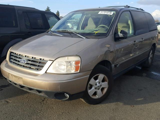 2FMZA57674BB04769 - 2004 FORD FREESTAR S TAN photo 2