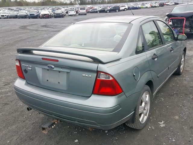 1FAFP34N25W276252 - 2005 FORD FOCUS ZX4 GREEN photo 4