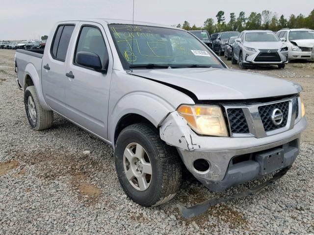 1N6AD07U06C467389 - 2006 NISSAN FRONTIER C GRAY photo 1