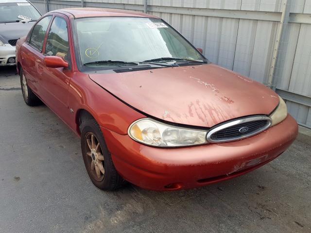 1FAFP6630XK153069 - 1999 FORD CONTOUR SE RED photo 1