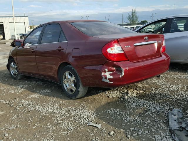 4T1BE32KX2U050793 - 2002 TOYOTA CAMRY LE RED photo 3