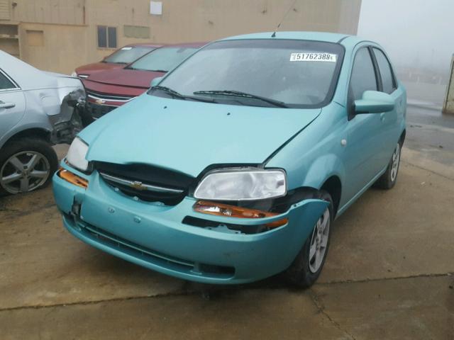 KL1TD52695B340718 - 2005 CHEVROLET AVEO BASE Yaşıl foto 2