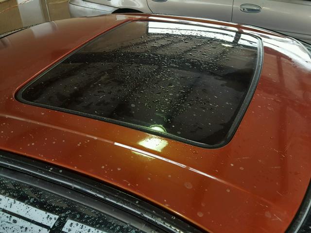 1G8ZR12712Z183088 - 2002 SATURN SC2 ORANGE photo 9