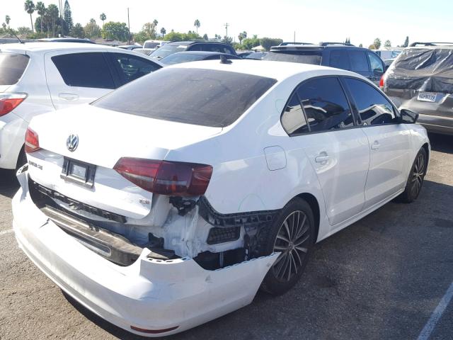 3VWD17AJ4GM333336 - 2016 VOLKSWAGEN JETTA SPOR WHITE photo 4