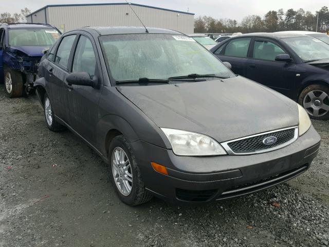 1FAFP34NX5W139723 - 2005 FORD FOCUS ZX4 GRAY photo 1