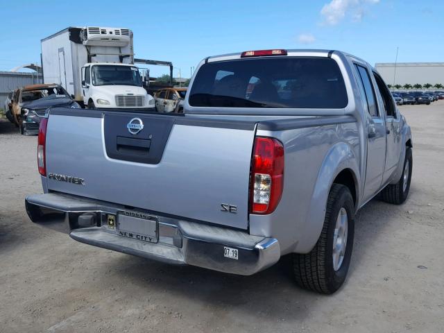 1N6AD07UX6C453659 - 2006 NISSAN FRONTIER C SILVER photo 4