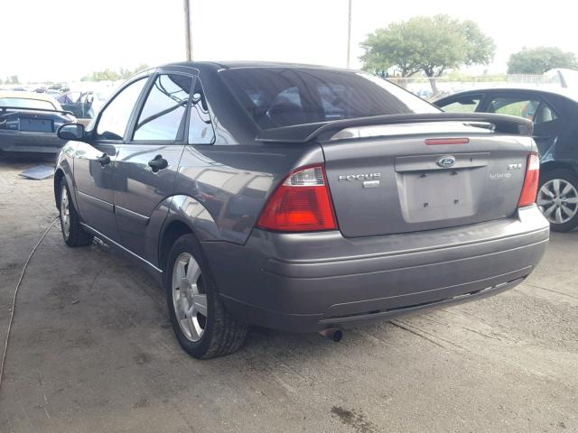1FAFP34N25W134337 - 2005 FORD FOCUS ZX4 GRAY photo 3