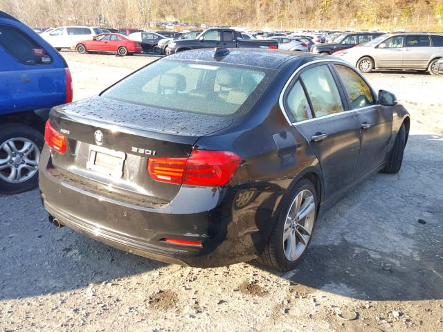 WBA8D9G36HNU63378 - 2017 BMW 330 XI BLACK photo 4