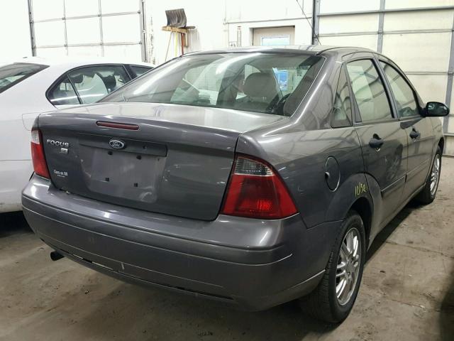 1FAFP34N07W258979 - 2007 FORD FOCUS ZX4 GRAY photo 4