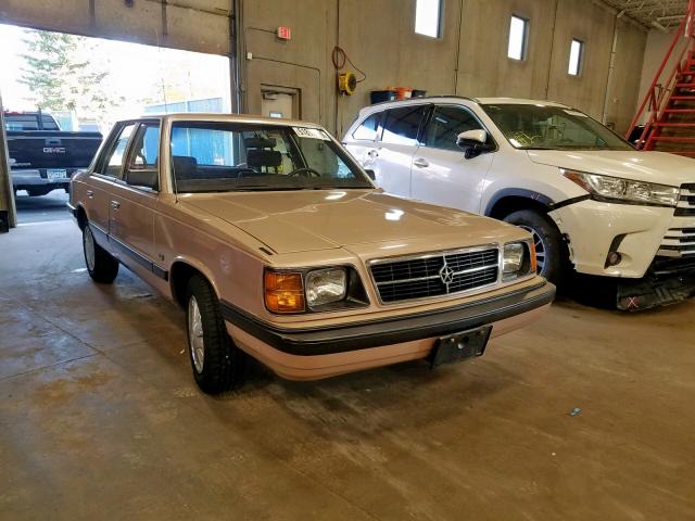 1B3BD46K7JF113411 - 1988 DODGE ARIES LE GOLD photo 1