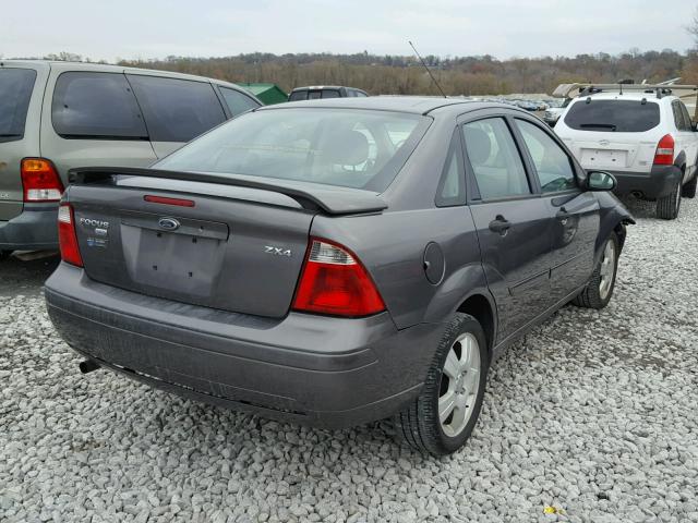 1FAFP34N46W181483 - 2006 FORD FOCUS ZX4 GRAY photo 4