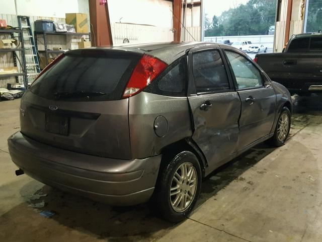 1FAHP37NX7W190727 - 2007 FORD FOCUS ZX5 GRAY photo 4